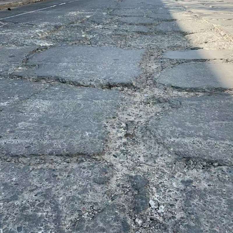 龙州路面起砂露石子修补料